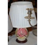 A Moorcroft table lamp, the white ground decorated with pink magnolia