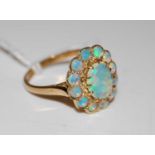 A 9ct gold opal cluster ring, ring size 'O', gross weight 3.4 grams