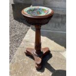 A William IV rosewood font with a 19th century Chinese famille rose Canton porcelain basin,