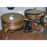 A near pair of embossed copper chafing / warming pans, together with another copper lidded pan,