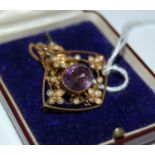 A yellow metal, split pearl and amethyst oval Art Nouveau pendant and chain, the pendant stamped '