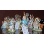 A group of nine Beswick Beatrix Potter figures to include 'Peter Rabbit', 'Old Mister Brown', '