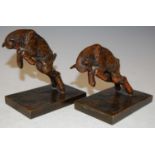 Paul Silvestre (1884-1976), a pair of bronze leaping lamb bookends, signed in the bronze and