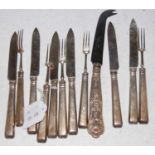 A Sheffield silver handled part fruit set comprising five forks and six knives, together with a