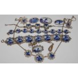 A collection of white metal and Delft ceramic jewellery to include bracelets, brooches, earrings