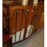 An early 20th century Art Deco style walnut two-door China cabinet