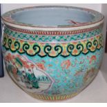 A Chinese porcelain turquoise ground jardiniere / fish bowl, Qing Dynasty, the exterior decorated