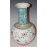 A Chinese porcelain famille rose bottle vase, 20th century, decorated with peony, chrysanthemum,