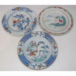 A group of Chinese porcelain, Qing Dynasty, comprising a clobbered blue and white soup plate