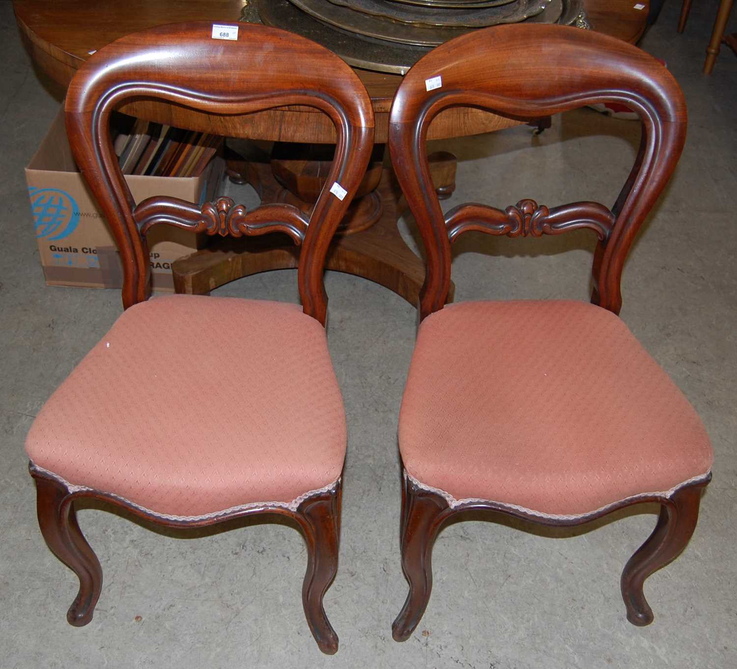 Two pairs of Victorian mahogany balloon back chairs, all with corresponding upholstered seats