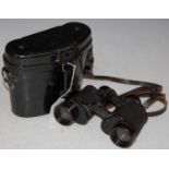 A vintage metal cased set of binoculars by 'SRB & STYS, Prague, Dienstglass 6x30, 587 13, H/6400'