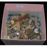 A large box of assorted costume jewellery, wristwatches etc