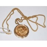 A 1980 half-Krugerrand in 9ct gold mount suspended from 9ct gold chain, gross weight 33.7 grams