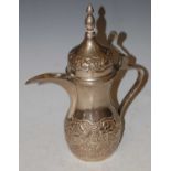 Middle Eastern white metal coffee pot and loose cover, stamped marks 'silver'
