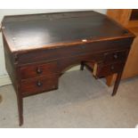 A 19th century stained pine estate desk with two detachable square-shaped covers revealing