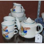 An early 20th century children's nursery part tea set with rabbit printed detail.