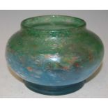 A short Monart vase, mottled blue, purple and green with three typical whorls and gold coloured