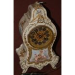 A late 19th century French Longwy porcelain mantle clock, with circular Arabic numeral dial above