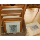 A box of assorted decorative pictures and prints