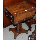 A 19th century rosewood work table on octagonal column and concave platform base with four bun feet