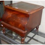 A Victorian mahogany commode with hinged top and green leather insert