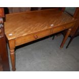 A 19th century satin birch side table with two cockbeaded frieze drawers