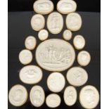 A collection of fifty-nine 19th century Italian Grand Tour plaster cameos, assorted shape and