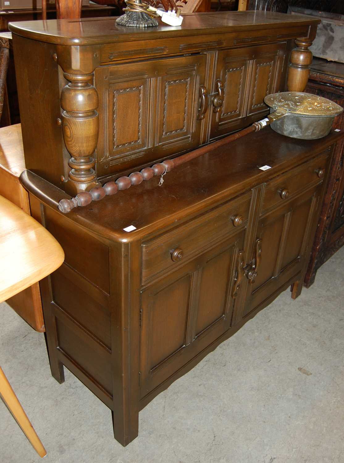 A stained wood Ercol type Jacobean style dresser