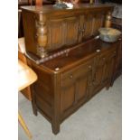 A stained wood Ercol type Jacobean style dresser
