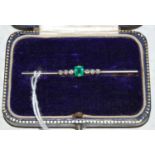 A yellow and white metal Art Deco style emerald and diamond bar brooch, makers marks of 'BHJ',