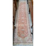 A 20th century machine-made Persian style runner, approx. 330cm x 70cm