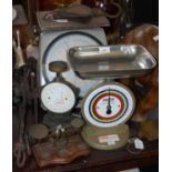 A collection of assorted weighing scales