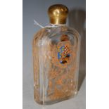 A Continental clear glass spirits flask with polychrome enamelled decoration of a Coat of Arms