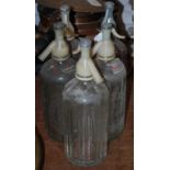 A group of five vintage Schweppes Soda water syphons
