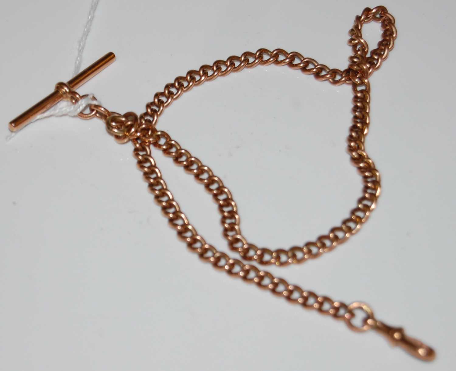 A 9ct gold Albert chain with T-bar suspension, 33.2 grams
