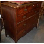 A George III mahogany and boxwood lined chest of two short over three long graduated drawers on