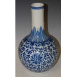 A Chinese porcelain blue and white bottle vase, 20th century, decorated in the Ming style with lotus