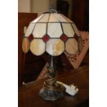 A Tiffany style leaded glass table lamp and shade