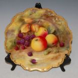 A Royal Worcester hand-painted cabinet plate decorated with fruit on a mossy ground signed T.