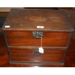 A vintage stained pine two drawer table top chest