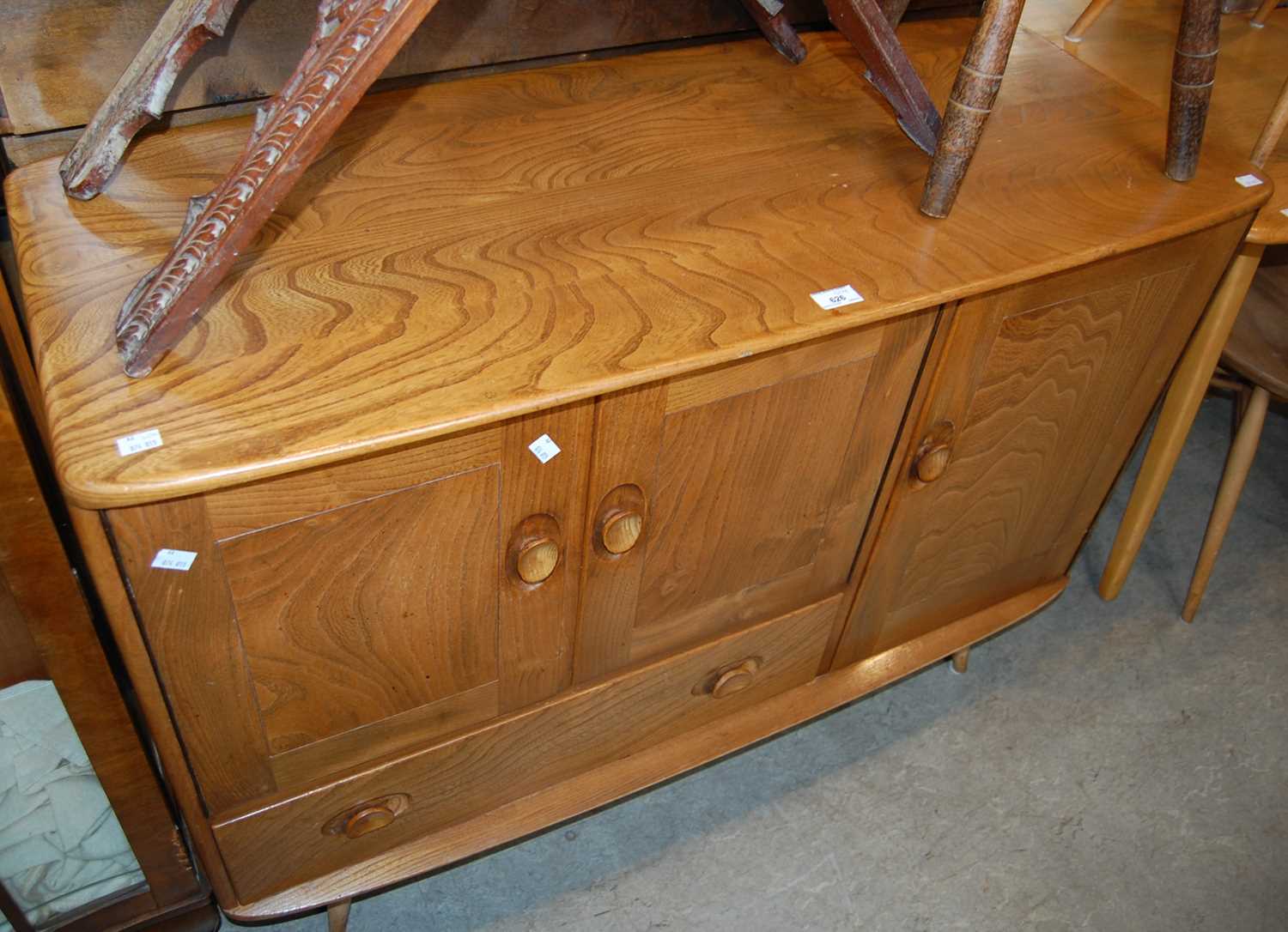 A vintage blonde wood Ercol dining room suite comprising sideboard fitted with three cupboard - Image 2 of 2