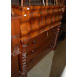 A 19th century flame mahogany ogee chest of drawers with barley twist supports