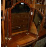 A mahogany triple plate dressing table mirror, together with two needlework embroidered fire screens