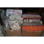 Two boxes of assorted textiles and threads