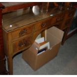 An early 20th century mahogany George III style dressing table