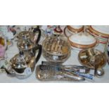 A group of EPNS to include teapot, toast rack, bottle stands, napkin rings, tea strainers, etc