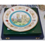 A group of three collectors plates to include The Lindisfarne Plate by Spode in original fitted