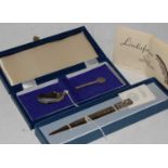 An Edinburgh silver letter opener by Carrs, with Celtic detail in original box with papers, together