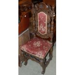 A 19th century oak Jacobean style chair