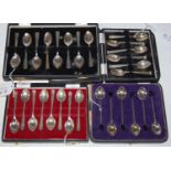 Four cased sets of silver coffee spoons, to include a set of six Sheffield silver Art Deco style